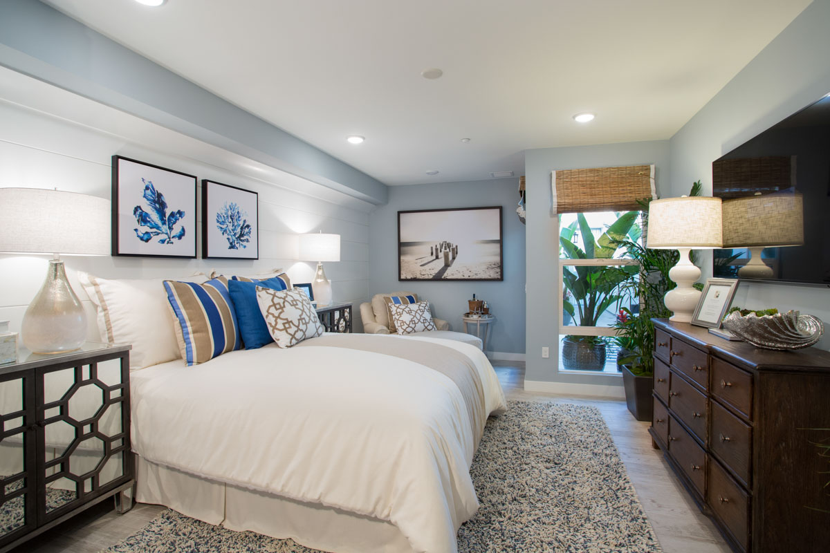 Bright and airy coastal modern bedroom at The Strand