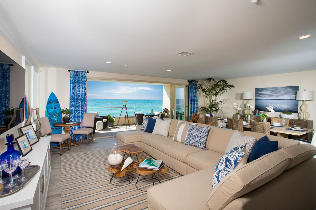 Over view of coastal living room area and balcony at The Strand