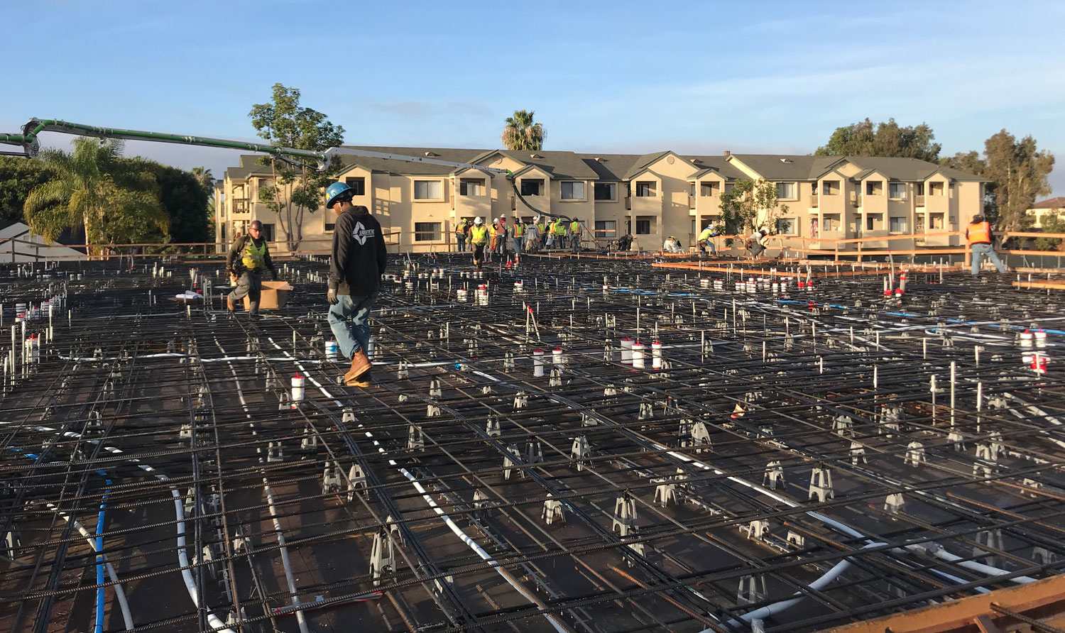 Construction workers laying out grid at Aviara