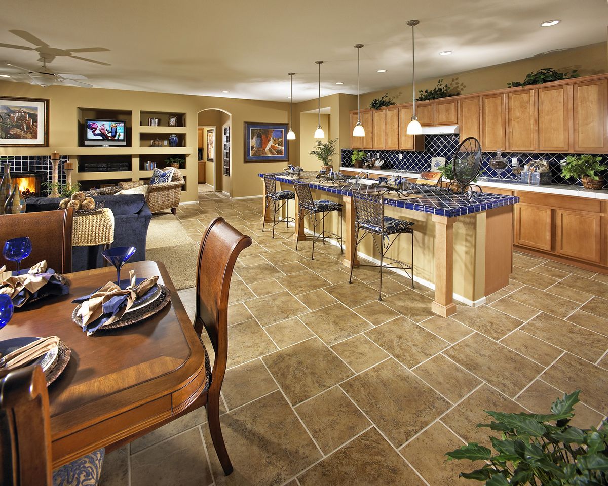 Kitchen and view of living room at the Luminaire residence