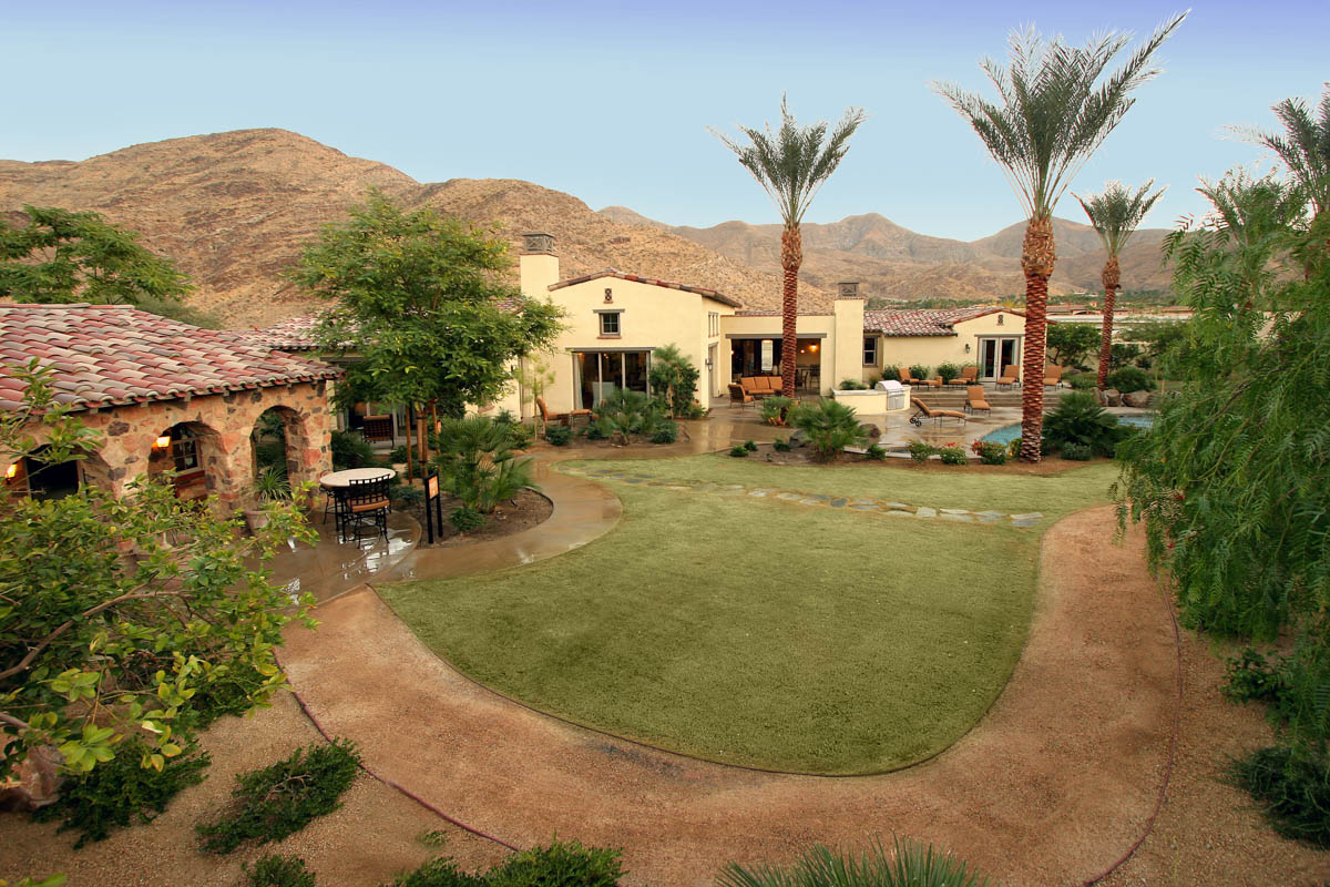 Back yard area with view of pool and back patio area in Monte Sereno