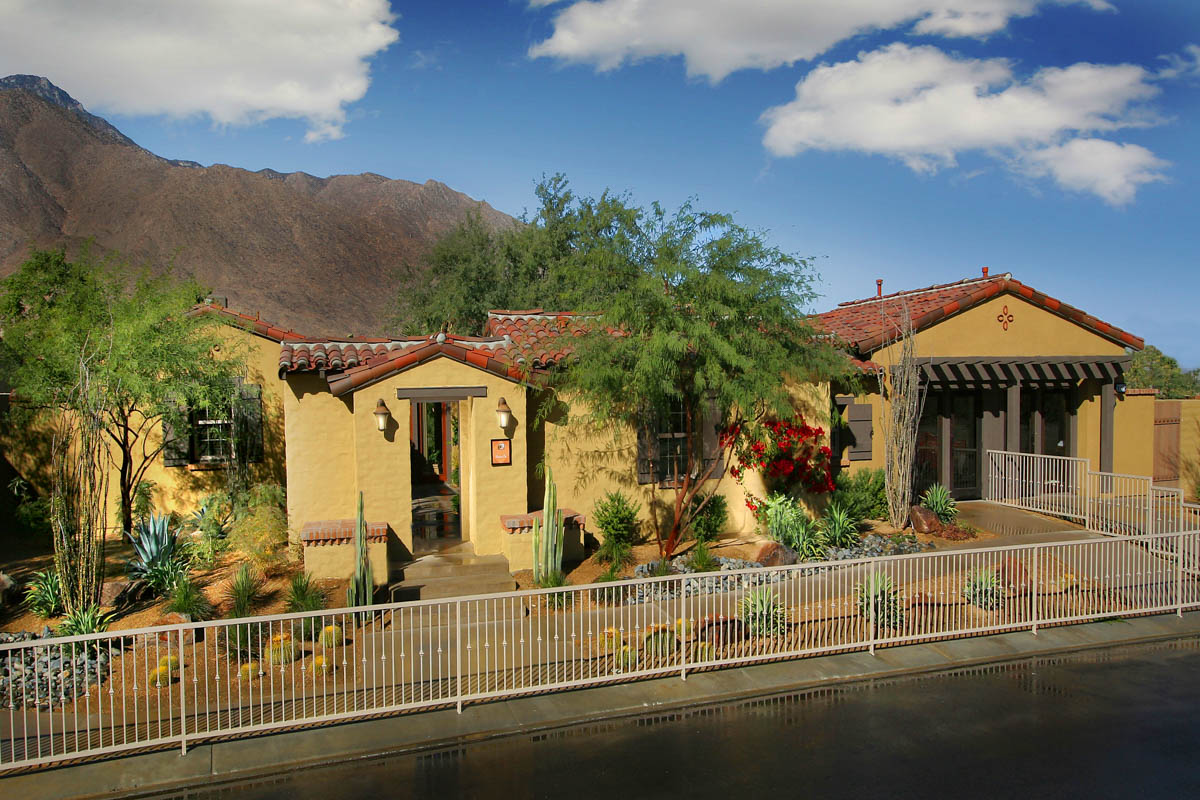 Front yard with white fence showcasing the Monte Sereno home