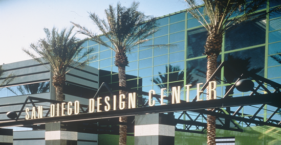 Front of the San Diego Design Center with signage and palm trees