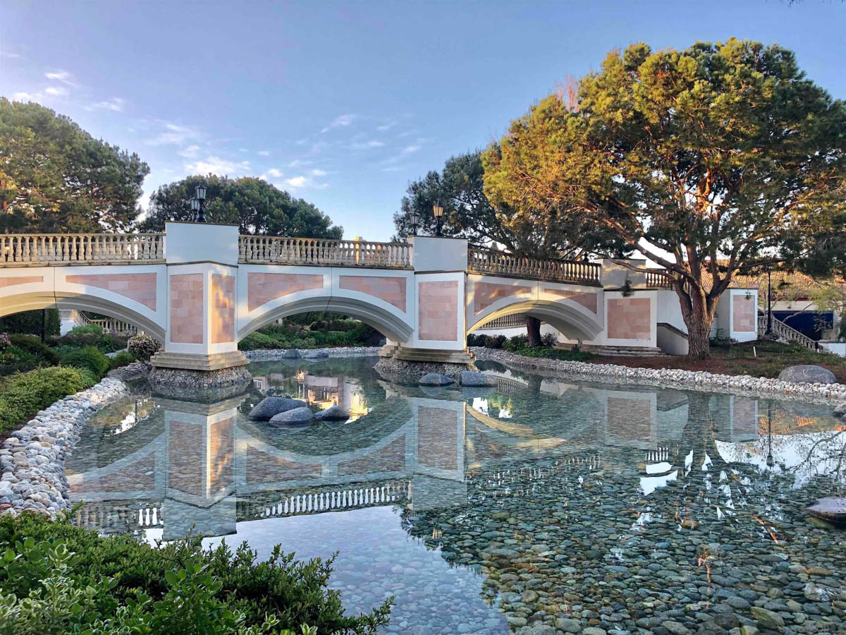 Beautiful bridge overlooking crystal clear stone river at Renaissance La Jolla