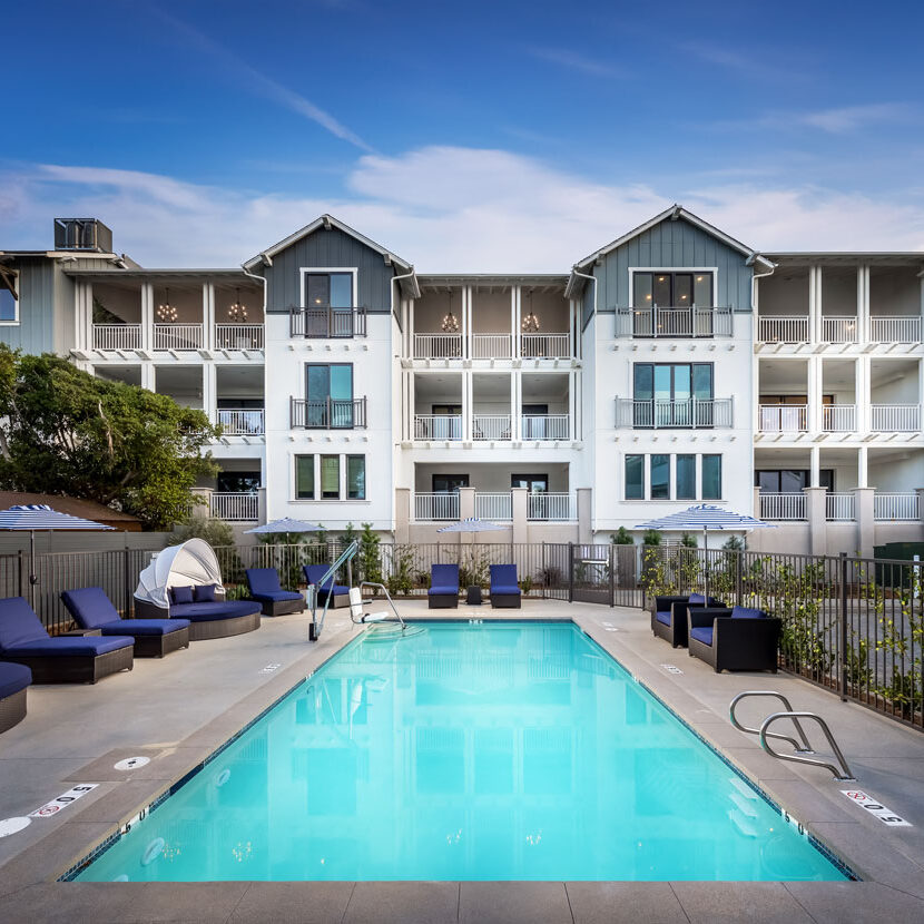 Outdoor oasis featuring a refreshing swimming pool in the backyard at Carlyle